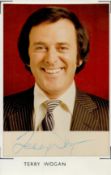 Terry Wogan signed 5x3.5 inch approx. colour photo mounted on paper. Sir Michael Terence Wogan KBE