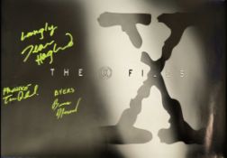 Tom Braidwood, Dean Haglund and Bruce Harwood signed The X Files 18x12 inch colour photo. Rolled.