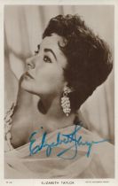 Elizabeth Taylor signed 6x4inch black and white picturegoer photo. Good condition. All autographs