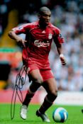 Ryan Babel signed 12x8 inch colour photo pictured in action for Liverpool. Good condition. All