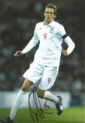 Peter Crouch signed 12x8 inch colour photo pictured while playing for England. Good condition. All