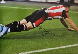 Neal Maupay signed colour photo Approx. 12x8 Inch. Is a French professional footballer who plays