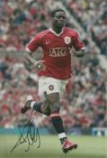 Louis Saha signed 12x8 inch colour photo pictured while playing for Manchester United. Good