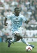 Shaun Wright Phillips signed 12x8 inch colour photo pictured in action for Manchester City. Good