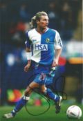Robbie Savage signed 12x8 inch colour photo pictured in action for Blackburn Rovers. Good condition.