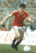 Frank Stapleton signed 12x8 inch colour photo pictured while playing for Manchester United. Good