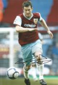David Nugent signed 12x8 inch colour photo pictured in action during his time with Burnley. Good