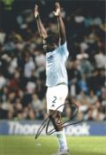 Micah Richards signed 12x8 inch colour photo pictured while playing for Manchester City. Good