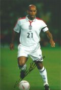 Trevor Sinclair signed 12x8 inch colour photo pictured in action for England. Good condition. All