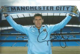 Gareth Barry signed 12x8 inch colour photo during his time with Manchester City. Good condition. All