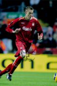 Peter Crouch signed 12x8 inch colour photo pictured while playing for Liverpool. Good condition. All
