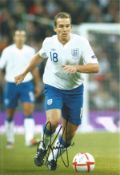 Kevin Davies signed 12x8 inch colour photo pictured in action for England. Good condition. All