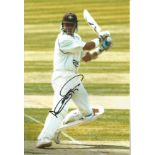 Alec Stewart signed 12x8 inch colour photo pictured in action for Surrey C.C.C. Good condition.