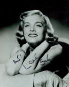 Lizabeth Scott signed 10x8 inch black and white photo. Good condition. All autographs come with a