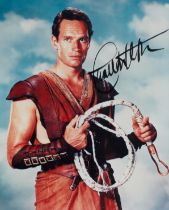 Charlton Heston signed 10x8 inch black and white photo. SECRATERIAL. Good condition. All