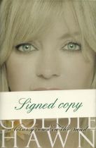 Goldie Hawn signed A lotus grows in the mud hardback book. Signed on inside title page. Good