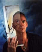 Fatboy Slim signed 10x8 inch colour photo. Good condition. All autographs come with a Certificate of
