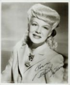 Betty Hutton signed 10x8 inch colour photo. Good condition. All autographs come with a Certificate