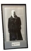 Kiefer Sutherland mounted signature with black and white photo from the movie The Lost Boys.