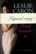 Leslie Caron signed Thank Heaven hardback book. Signed on inside title page. Good condition. All