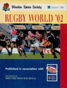 Gareth Edwards and one other signed hardback book titled Rugby World '02 signatures on the inside