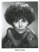 Tricia O'Neil signed 10x8inch black and white photo. Good condition. All autographs come with a