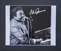 Fats Domino signed 12x10 inch overall mounted black and white photo. Good condition. All