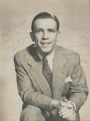 Norman Wisdom signed 10x8inch vintage photo. Slightly faded. Dedicated. Good condition. All
