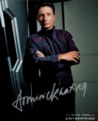 Dominic Keating signed 10x8 inch Star Trek Enterprise colour photo. Good condition. All autographs