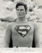 Christopher Reeve signed 10x8 inch Superman black and white vintage photo dedicated. Good condition.