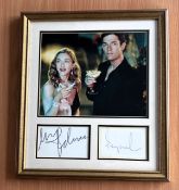 Madonna and Rupert Everett signed frame with colour photo with signatures below. Photo from