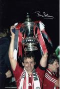 Autographed BRYAN ROBSON 12 x 8 Photo : Col, depicting a superb image showing Man United captain