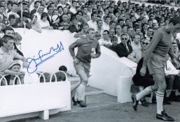 Autographed JIMMY GREENHOFF 12 x 8 Photo : B/W, depicting a superb image showing Leeds United's