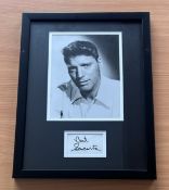 Burt Lancaster signed black and white photo in frame and signature below. Measures 13"x17" appx.