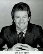 Jim Davidson signed 10x8 inch black and white promo photo. Good condition. All autographs come