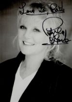 Petula Clark signed 7x5 inch black and white photo. Dedicated. Good condition. All autographs come