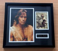 Kevin Sorbo signed frame 2 colour photos, 1 signed and name plaque. Measures 15"x17" appx. Good