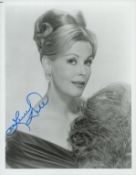 Arlene Dahl signed 10x8 inch black and white photo. Good condition. All autographs come with a