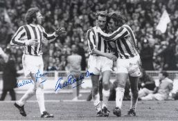 Autographed STOKE CITY 12 x 8 Photo : B/W, depicting Stoke City's GEORGE EASTHAM being congratulated