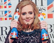 Adele signed 10x8 inch colour photo. Good condition. All autographs come with a Certificate of