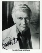 Charlton Heston signed 10x8 inch colour photo. Good condition. All autographs come with a