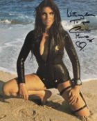 James Bond actress Caroline Munro stunning signed sexy 8x10 inch photo for Lambs Navy Rum. Good