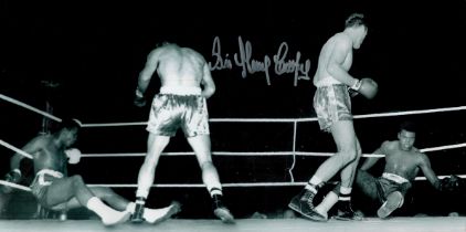 Sir Henry Cooper signed 16x8 black and white photo picturing the iconic moment when Henrys hammer