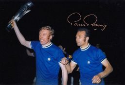 Autographed PAUL REANEY 12 x 8 Photo : Col, depicting a superb image showing Leeds United's Mick