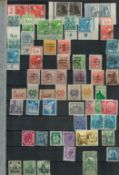 Worldwide Stamps in a Stockbook with some loose pages Includes Bermuda Block of Four Mint Coronation