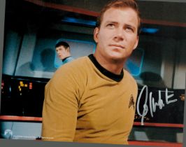 William Shatner signed 10x8 inch Star Trek colour photo. Good condition. All autographs come with