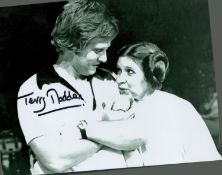 Terry Madden producer signed 10 x 8 inch b/w Star Wars scene photo with Princess Leia Carrie Fisher.