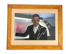 Peter Capaldi signed 16x13 inch overall framed and mounted Dr Who colour photo. Good condition.