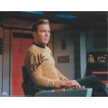 William Shatner signed 10x8 inch Star Trek colour photo. Good condition. All autographs come with