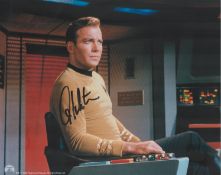 William Shatner signed 10x8 inch Star Trek colour photo. Good condition. All autographs come with
